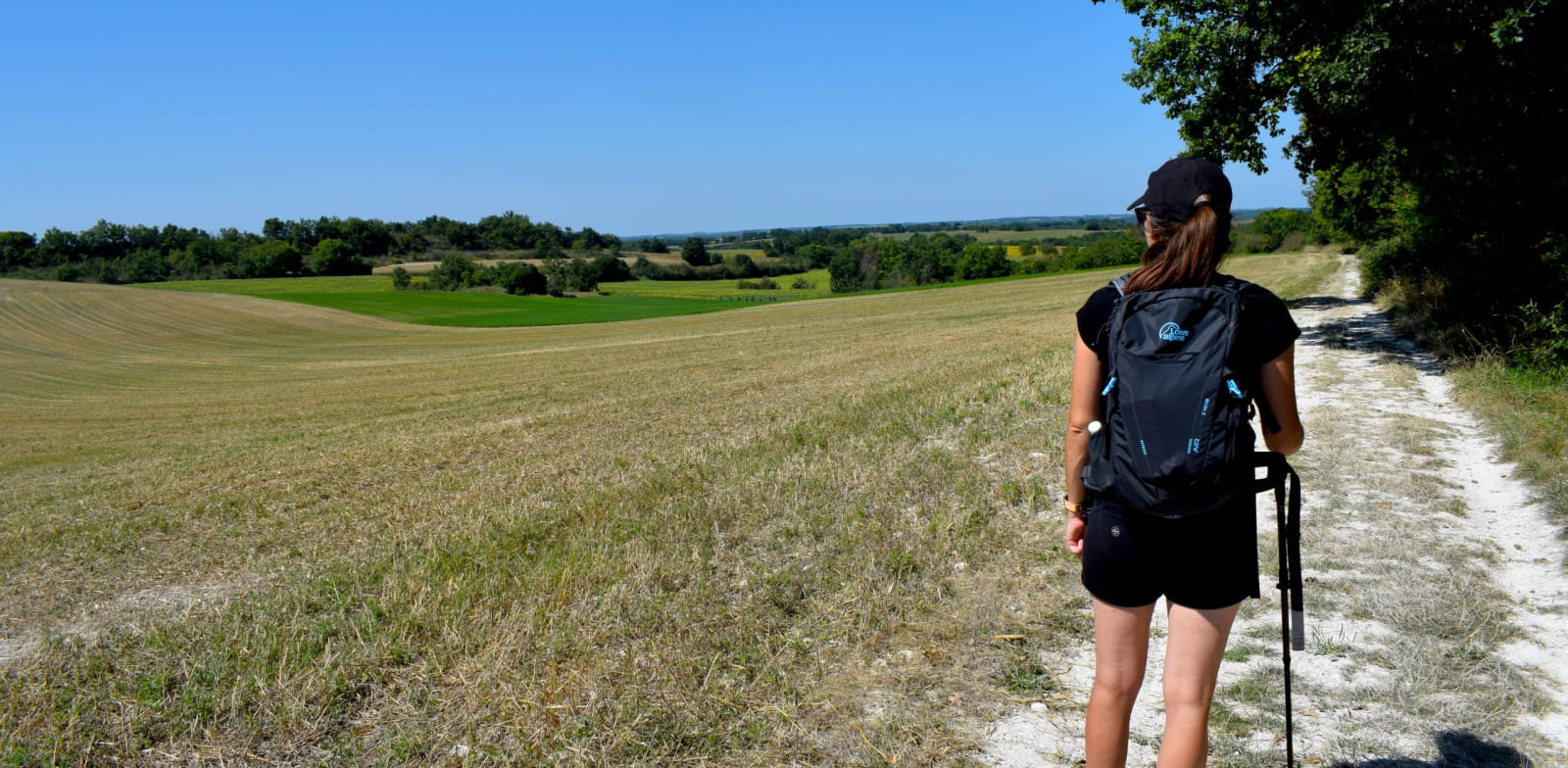 Hiker walking on the way to Santiago de Compostela in Quercy Blanc